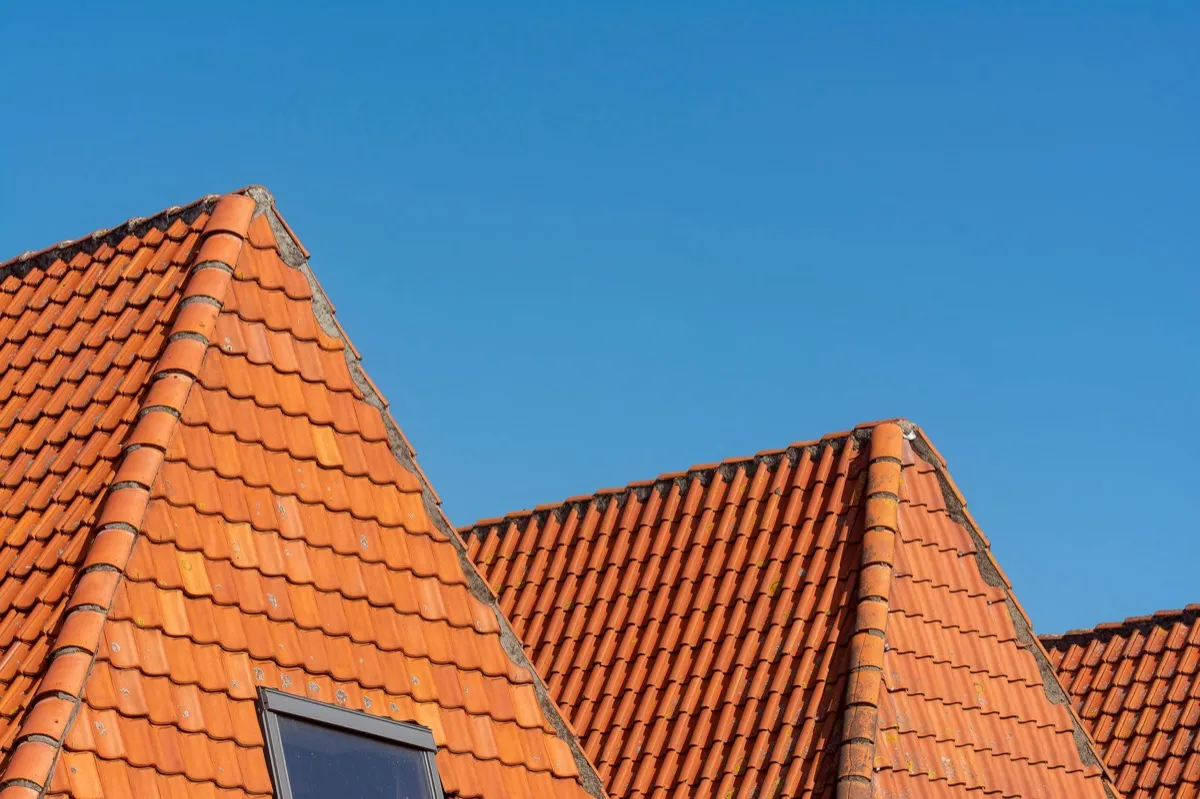 Clay barrel tile rooflines on homes in Naperville, IL
