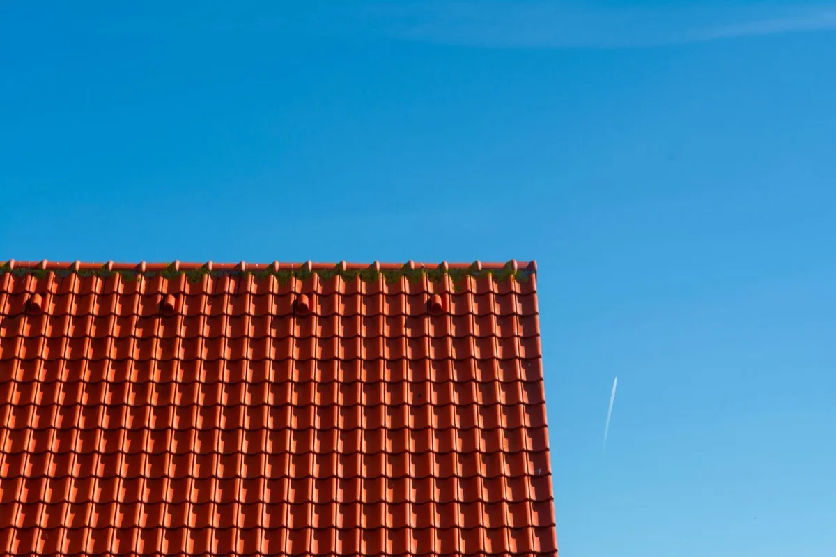 Tile roof gable in full sun, the kind of exposure that sets roof life in Naperville, IL